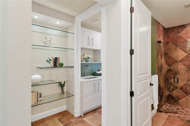 1884 Grove St, Sarasota, FL 34239 - hallway featuring a sink, recessed lighting, and light tile patterned floors