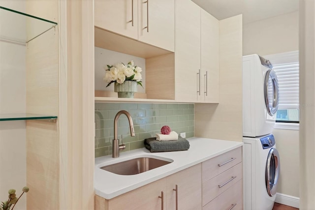1884 Grove St, Sarasota, FL 34239 - laundry room with stacked washer and clothes dryer and cabinet space