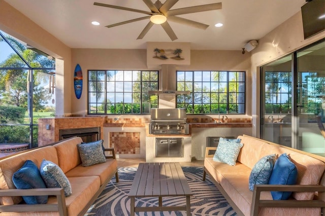 sunroom featuring ceiling fan