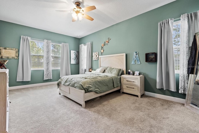 14607 Swiss Bridge Dr, Lithia, FL 33547 - carpeted bedroom featuring ceiling fan and baseboards
