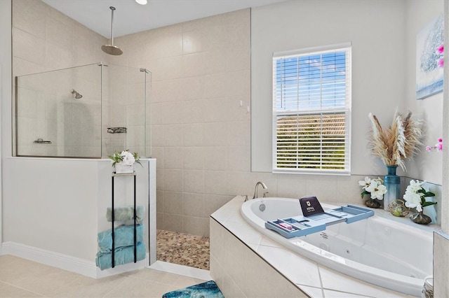 bathroom with shower with separate bathtub, plenty of natural light, and tile patterned flooring