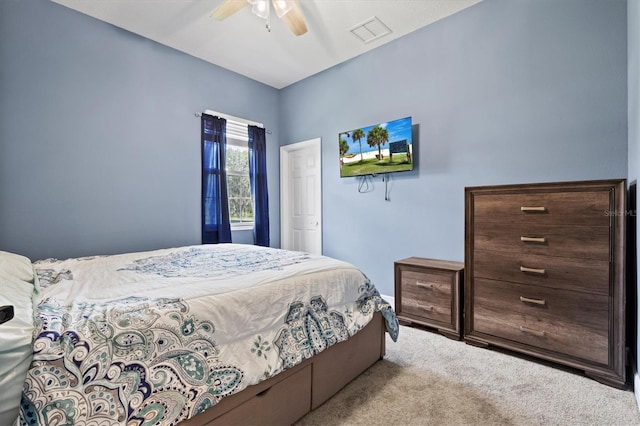 carpeted bedroom with ceiling fan