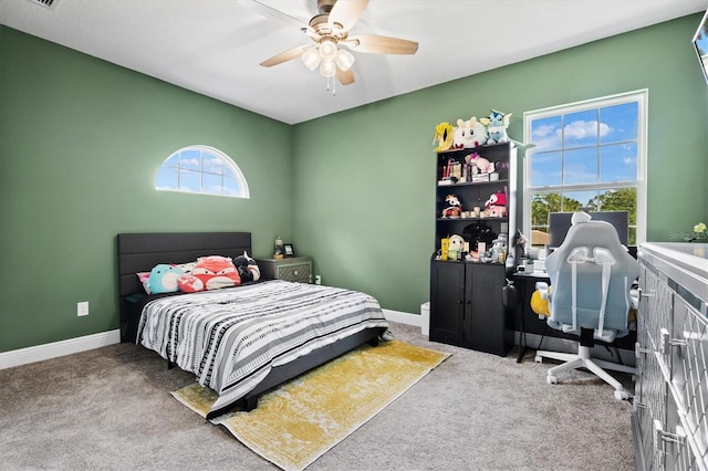 carpeted bedroom with ceiling fan