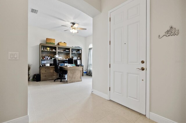 14607 Swiss Bridge Dr, Lithia, FL 33547 - office featuring light tile patterned floors, visible vents, a ceiling fan, and baseboards
