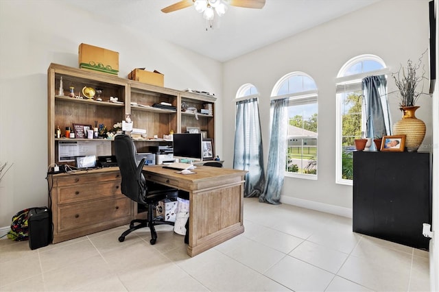 office with light tile patterned flooring and ceiling fan