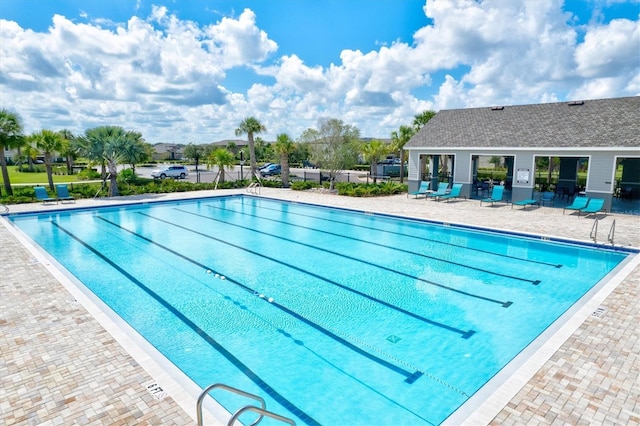 14607 Swiss Bridge Dr, Lithia, FL 33547 - community pool featuring a patio area and fence