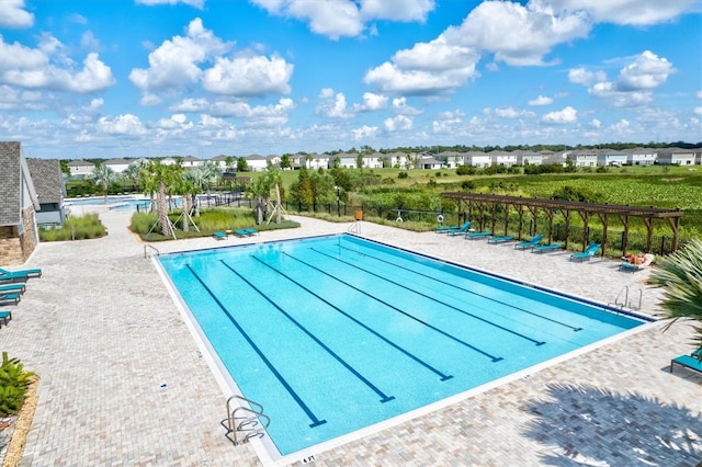 14607 Swiss Bridge Dr, Lithia, FL 33547 - pool featuring a residential view and fence