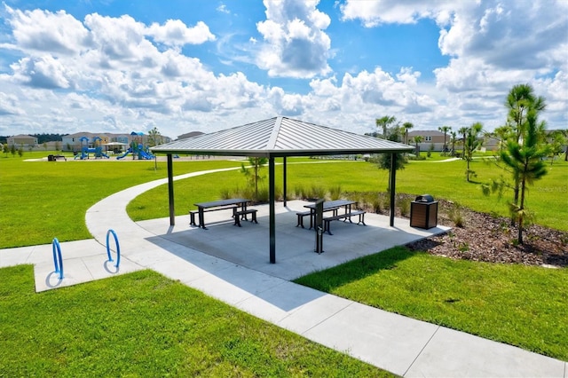 14607 Swiss Bridge Dr, Lithia, FL 33547 - view of home's community featuring a gazebo, playground community, and a yard