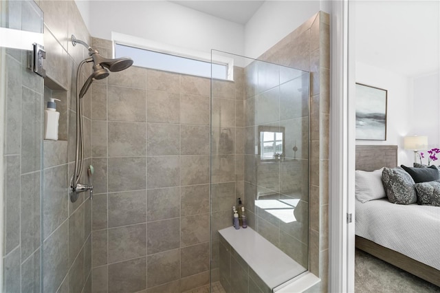 bathroom with tiled shower