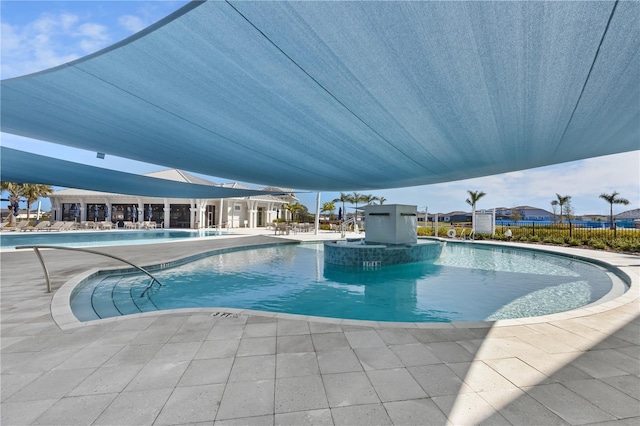 view of pool with a patio