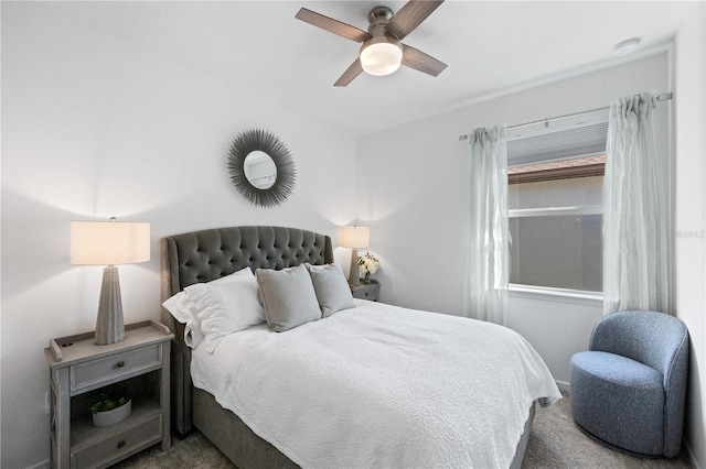 bedroom with ceiling fan and carpet