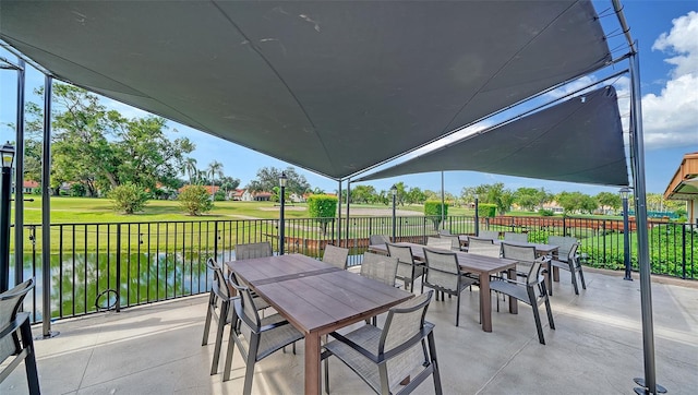 view of patio / terrace featuring a water view