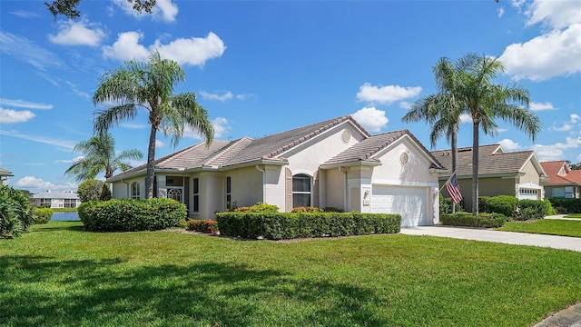 single story home featuring a garage and a front yard