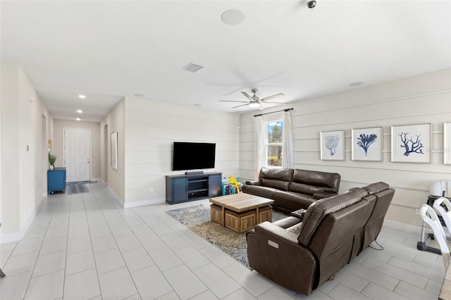 living room with ceiling fan