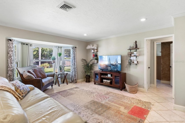 tiled living room featuring ornamental molding and a textured ceiling