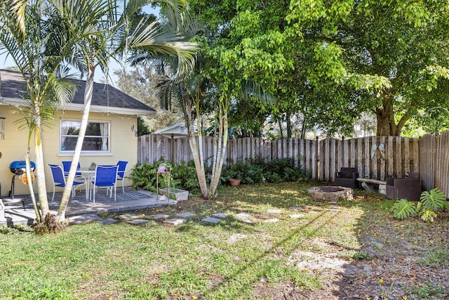 view of yard featuring a wooden deck