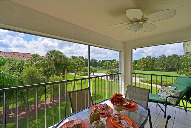 unfurnished sunroom featuring plenty of natural light and ceiling fan