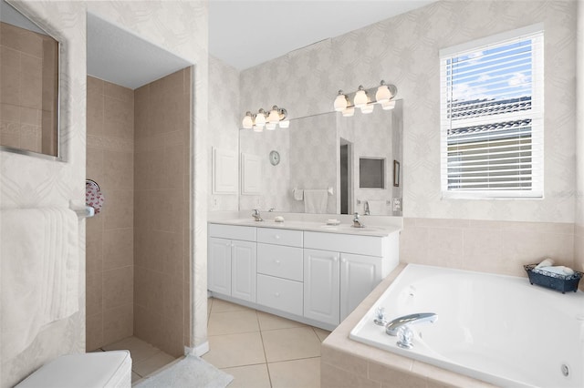 bathroom with separate shower and tub, tile patterned flooring, and vanity