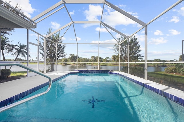 view of pool featuring glass enclosure and a water view