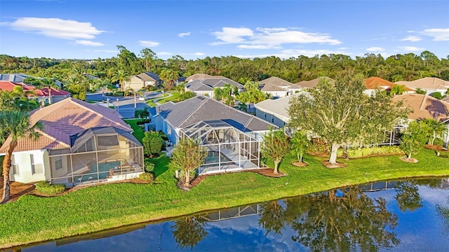 bird's eye view with a water view