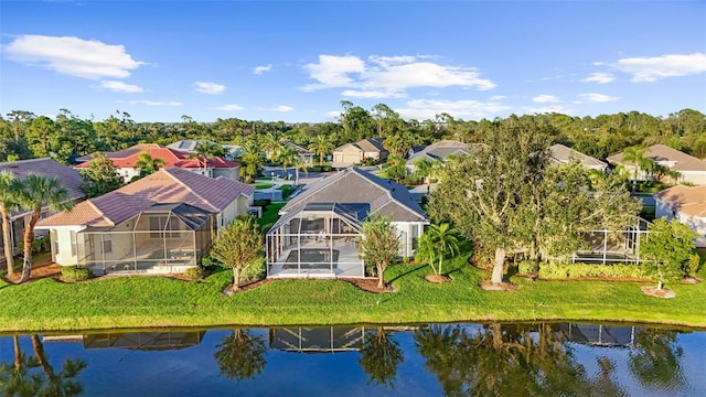 drone / aerial view with a water view