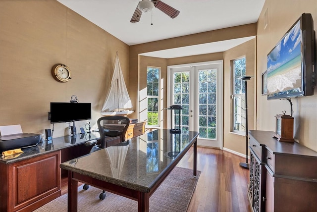 office area with dark hardwood / wood-style floors and ceiling fan