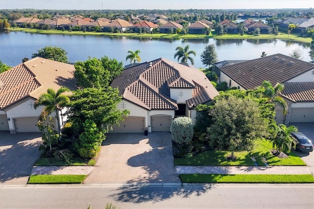 drone / aerial view with a water view