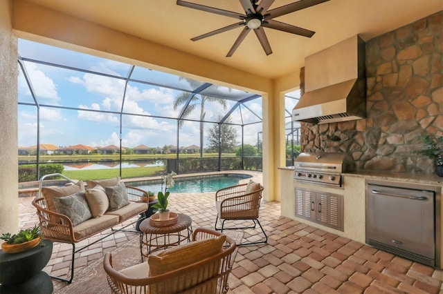 view of patio / terrace featuring ceiling fan, an outdoor kitchen, a lanai, an outdoor living space, and grilling area