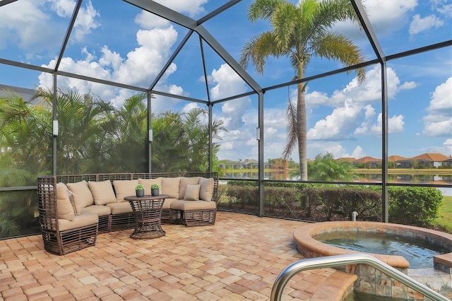 view of patio featuring outdoor lounge area, a jacuzzi, and a lanai