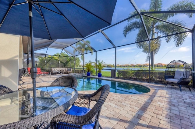 view of swimming pool featuring an outdoor living space, a water view, glass enclosure, and a patio area