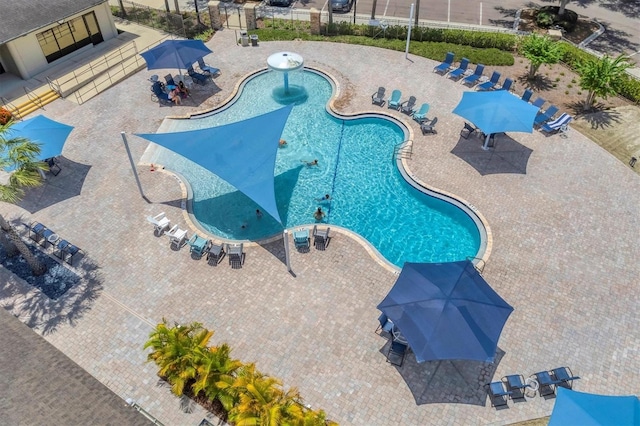 view of pool featuring a patio