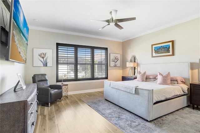 bedroom with ceiling fan, ornamental molding, and light wood-type flooring