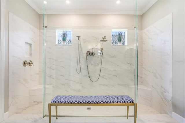 bathroom featuring a shower with door and crown molding