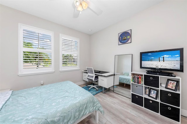 bedroom featuring ceiling fan and light hardwood / wood-style flooring