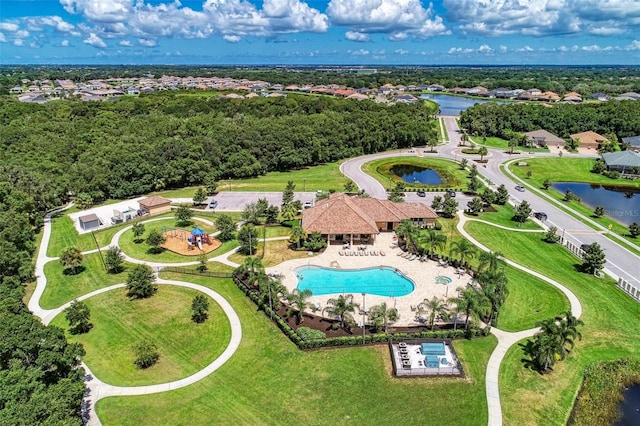 birds eye view of property with a water view