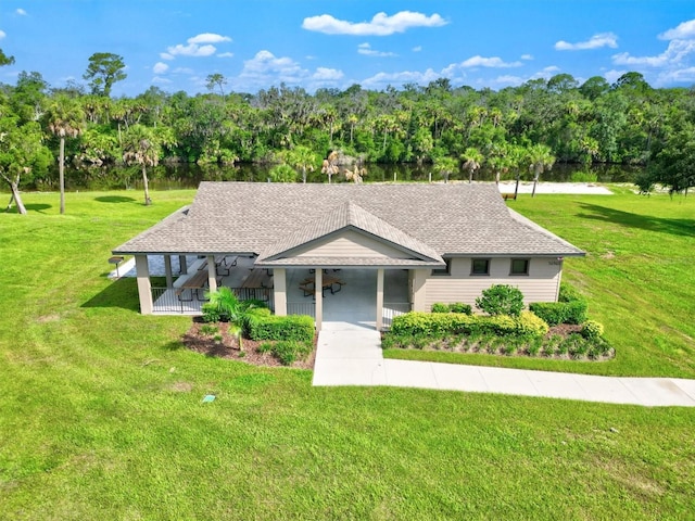 view of front of property with a front lawn and covered porch