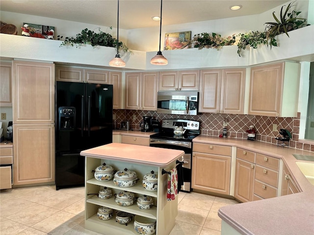 kitchen with appliances with stainless steel finishes, hanging light fixtures, decorative backsplash, light tile patterned floors, and light brown cabinetry