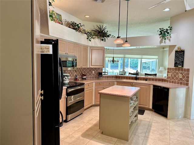 5658 Downham Mdws, Sarasota, FL 34235 - kitchen with light countertops, tasteful backsplash, light brown cabinets, and black appliances