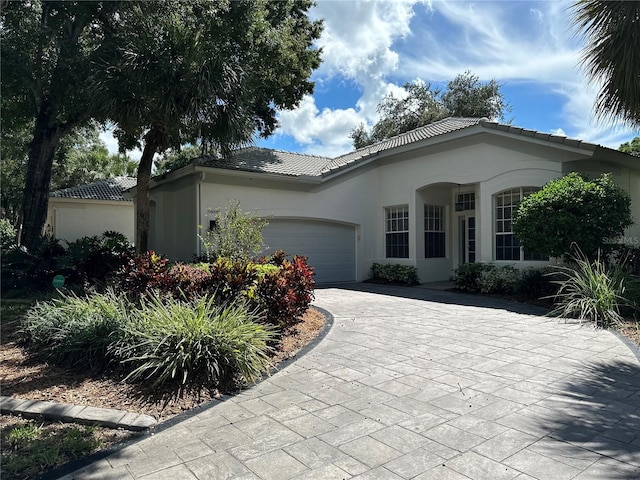 view of front of house with a garage