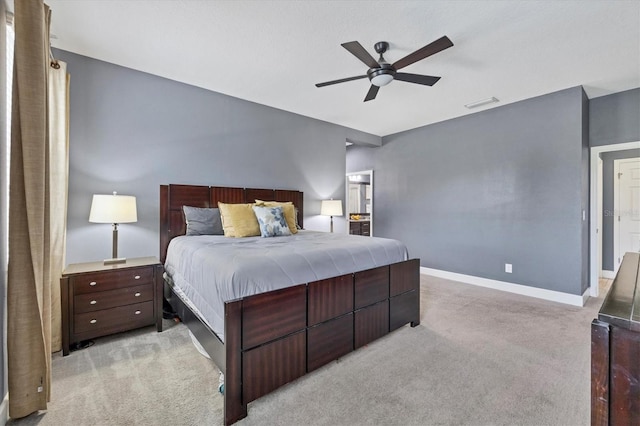 carpeted bedroom with ceiling fan