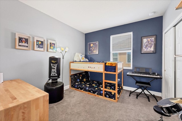 carpeted bedroom with a closet