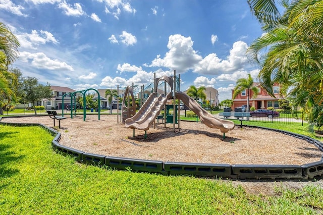 view of playground featuring a lawn