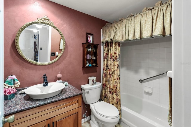 full bathroom featuring shower / bath combo with shower curtain, vanity, and toilet