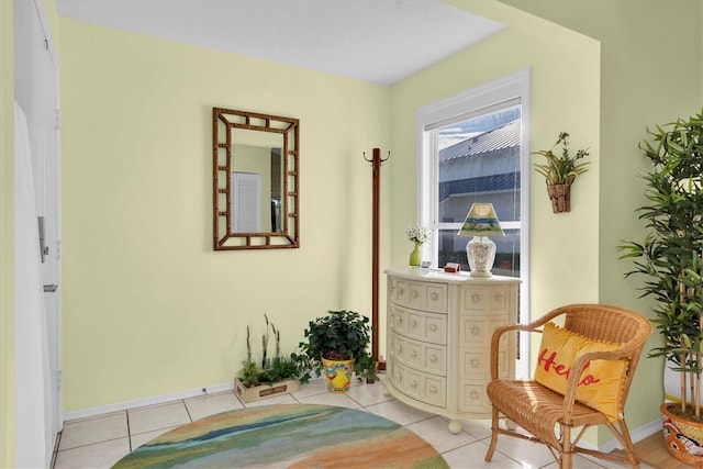 living area featuring light tile patterned floors