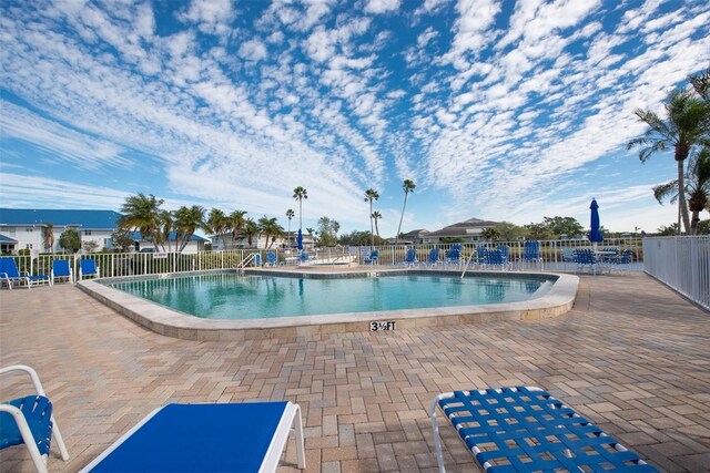 view of swimming pool featuring a patio