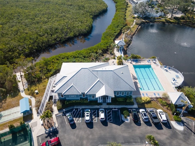 birds eye view of property featuring a water view