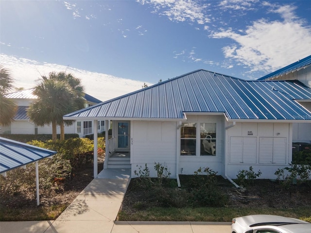 835 Audubon Dr Unit 835, Bradenton, FL 34209 - view of front facade with metal roof