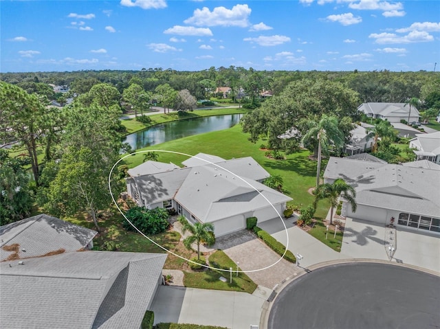 bird's eye view with a water view