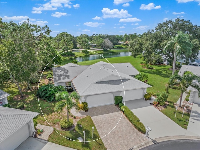 bird's eye view with a water view