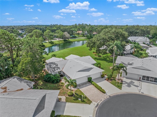 bird's eye view with a water view